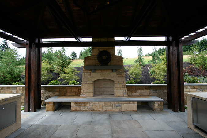 large fireplace in outdoor kitchen